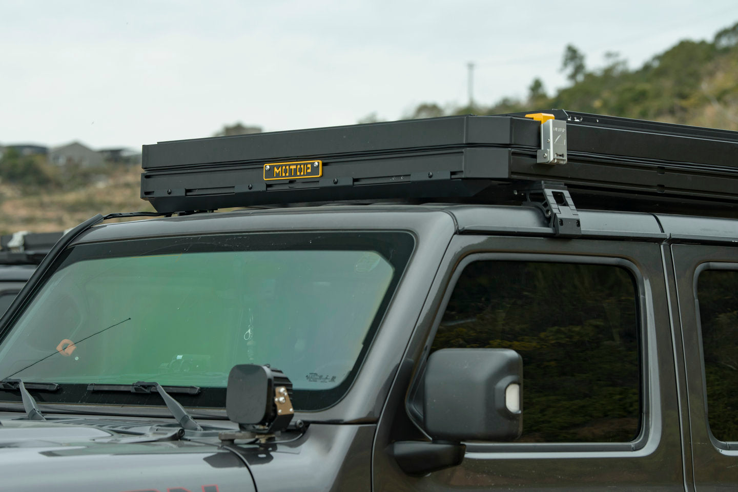 Motop X Series AX-530 Plus rooftop tent set up for outback and coastal camping, built for Australian conditions