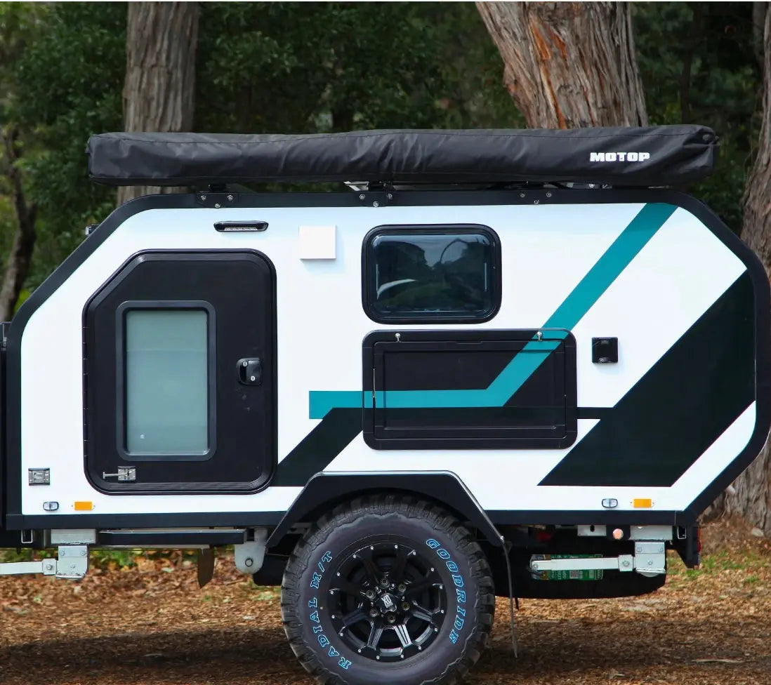 Towable overland camper featuring integrated electrics, LED lighting, and year-round comfort.